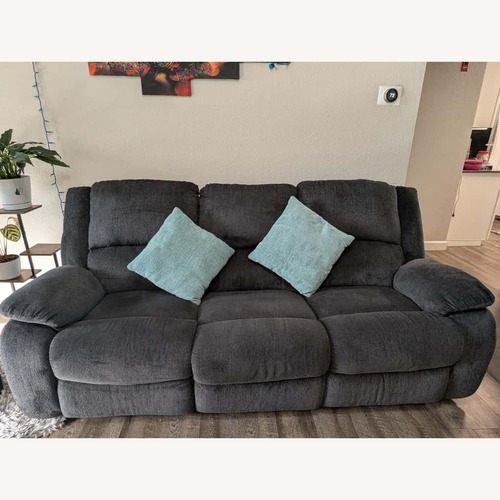 Used Ashley Modern Reclining Sofa  for sale on AptDeco