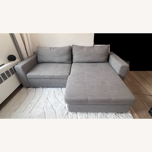 Used Gray Fabric 2 Piece Sectional Bed & Storage for sale on AptDeco