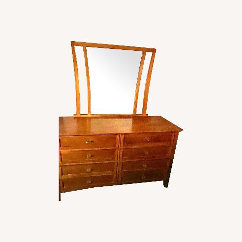 Used Bob's Discount Furniture Light Brown Wood Dresser for sale on AptDeco