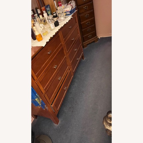 Used Bob's Discount Furniture Light Brown Wood Dresser for sale on AptDeco