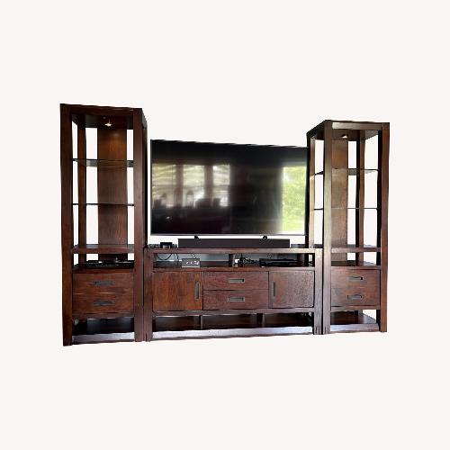 Used Raymour & Flanigan Dark Brown Wood Media Storage for sale on AptDeco