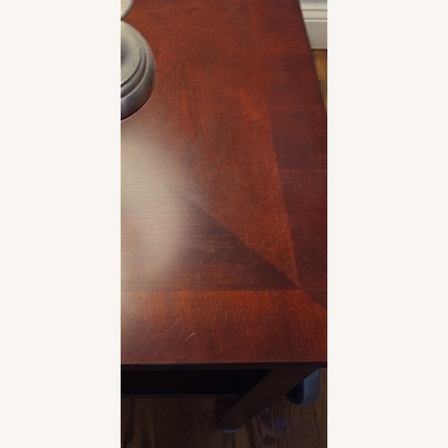 Used Raymour & Flanigan Dark Brown Wood Side Tables for sale on AptDeco