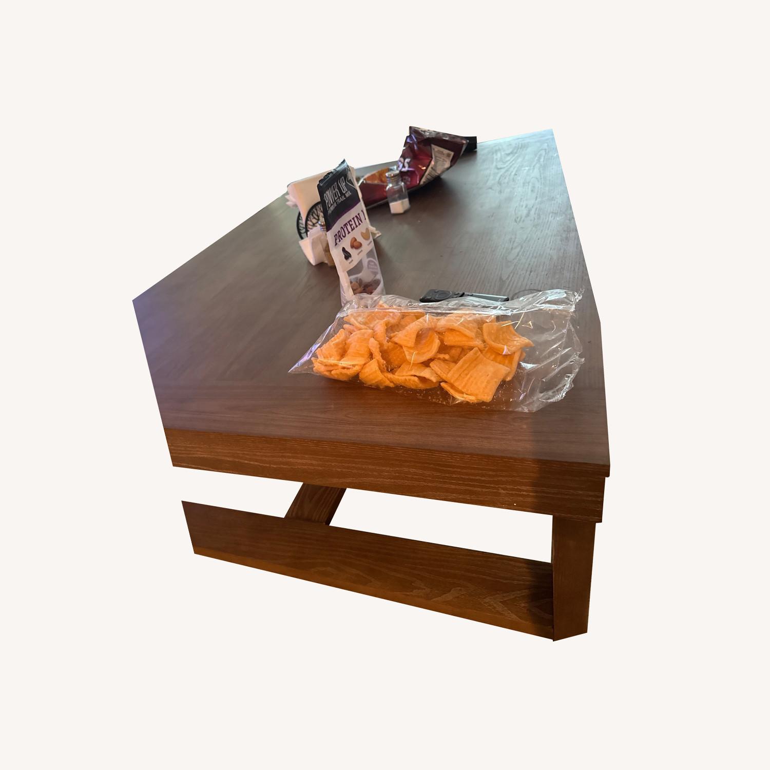 Ashley Furniture Dark Brown Wood Coffee Table - image-0