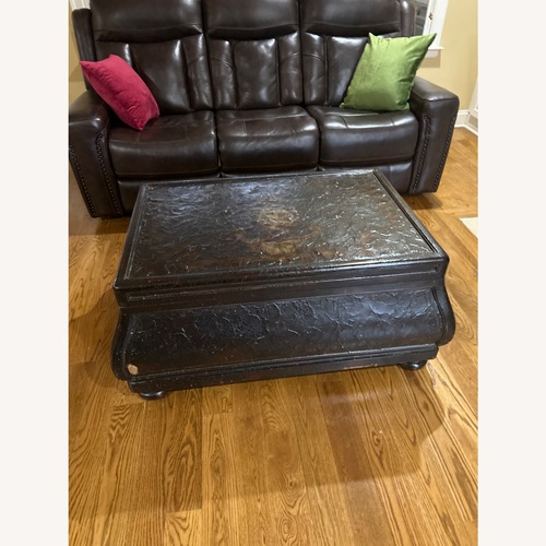 Used Wooden Brown Distress Rectangular Coffee Table for sale on AptDeco