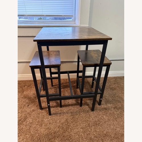 Used High-Top Table + 2 Stools for sale on AptDeco