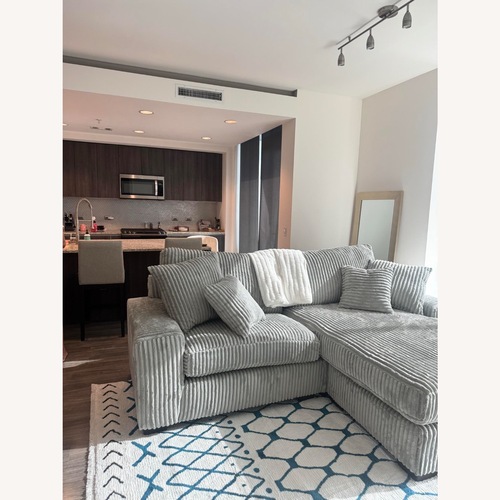 Used Light Gray 2 Piece Sectional for sale on AptDeco