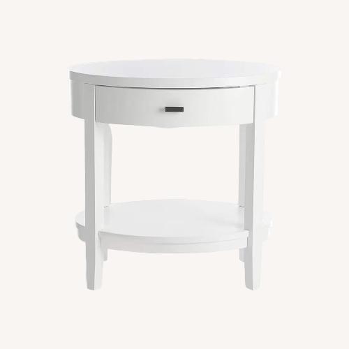 Used Crate & Barrel Arch White Oval Nightstands for sale on AptDeco