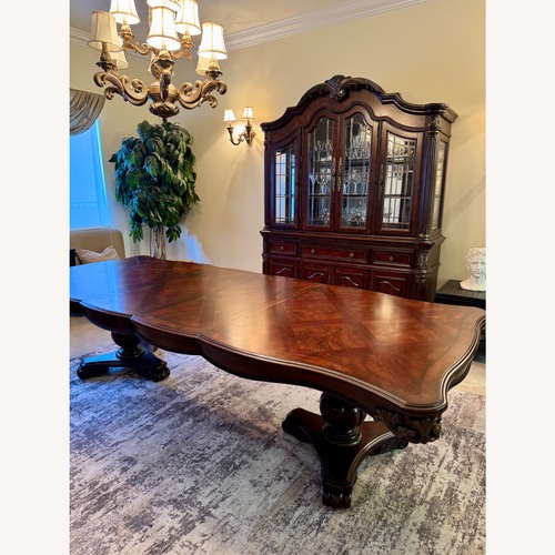 Used Vintage Dark Brown Wood Dining Set for sale on AptDeco