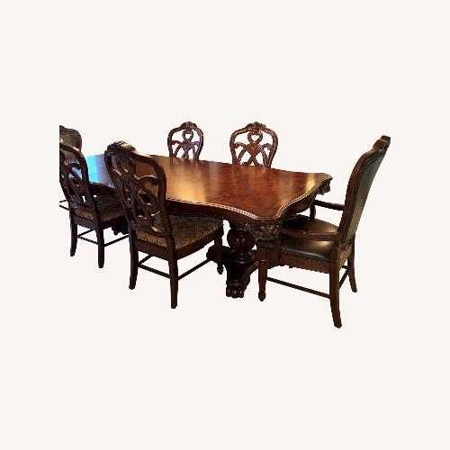Used Vintage Dark Brown Wood Dining Set for sale on AptDeco