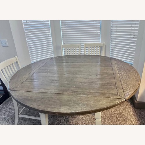 Used Ashley Furniture Dark Brown Dining Set for sale on AptDeco