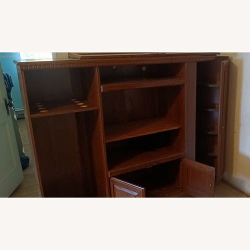 Used Wooden Entertainment Center  for sale on AptDeco