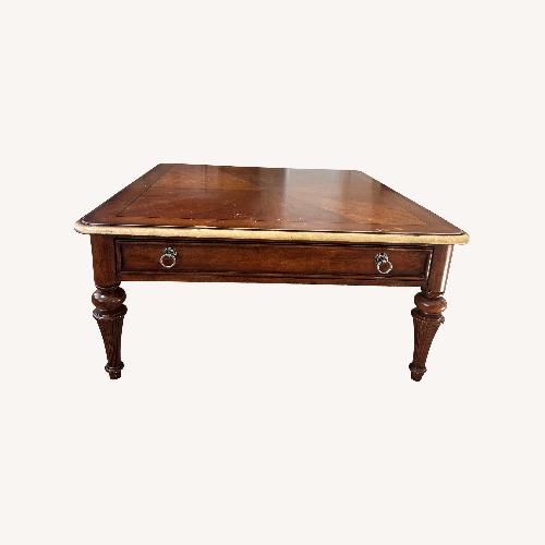 Used Dark Brown Wood Coffee Table for sale on AptDeco