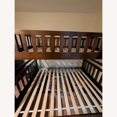 Used Ashley Furniture Dark Brown Wood Bunk Bed for sale on AptDeco
