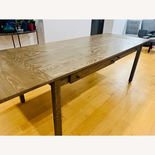 Used Crate & Barrel Dining Table for sale on AptDeco