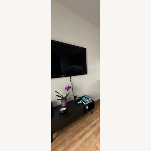 Used Walmart Black Wood Coffee Table for sale on AptDeco