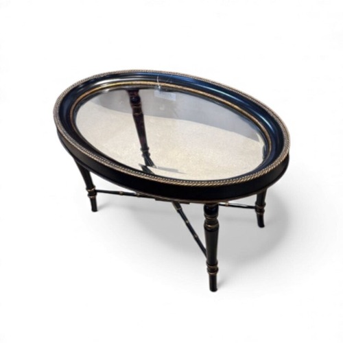 Used Mindi Antique Oval Coffee Table for sale on AptDeco