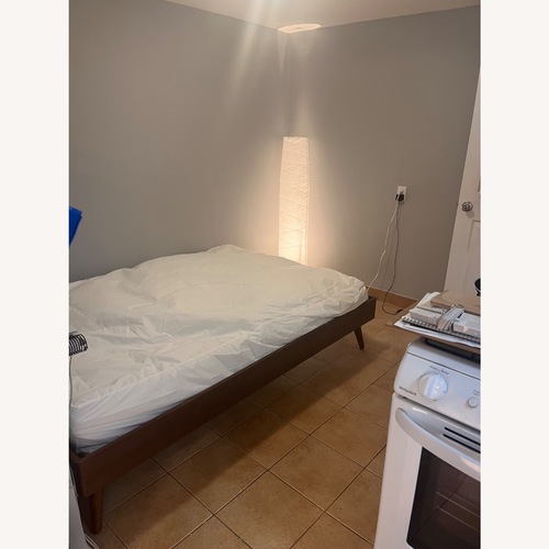 Used Wayfair Dark Brown Wood Full Bed for sale on AptDeco