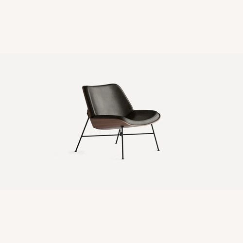 Used Burrow Vesper Black Leather Chair and Ottoman for sale on AptDeco