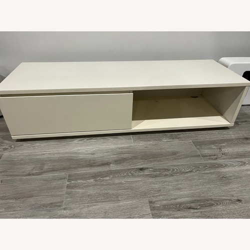 Used White Gloss Wood TV Stand with Media Storage for sale on AptDeco