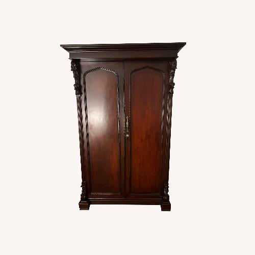Used British Colonial Carved Rosewood Antique Armoire for sale on AptDeco
