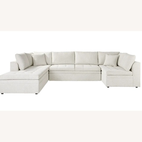 Used Rooms To Go Cindy Crawford Natural Fabric 3+ Piece Sectional for sale on AptDeco