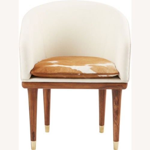 Used CB2 Viceroy Cowhide Dining Chairs for sale on AptDeco