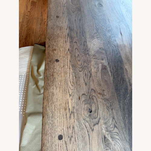 Used Crate & Barrel Wood Dining Table and bench for sale on AptDeco