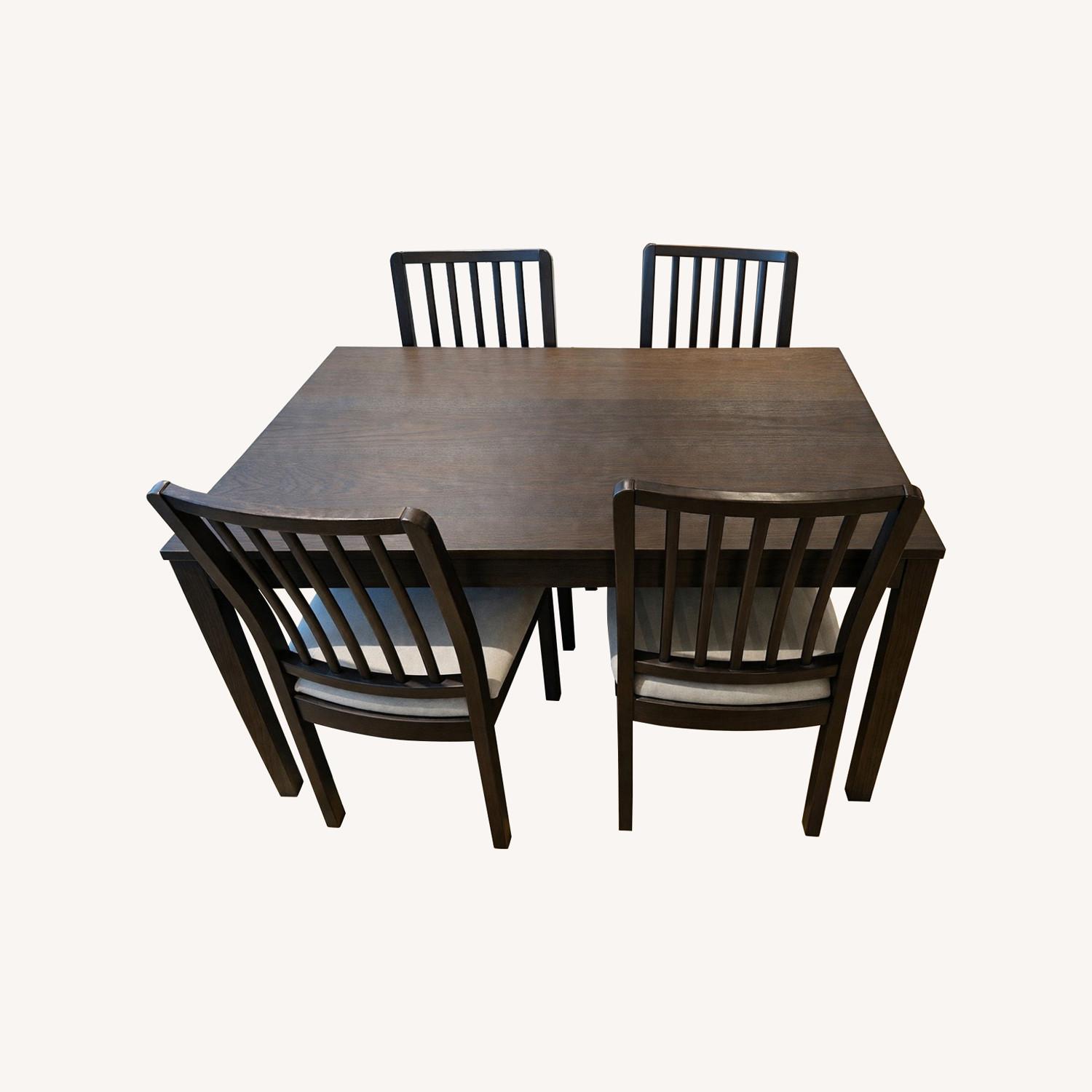 IKEA Dark Brown Wood Dining Set with 4 Chairs - image-0