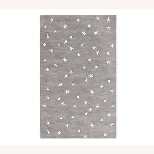 Used Pottery Barn Kids Starry Skies Rug & Pad 7x10 for sale on AptDeco