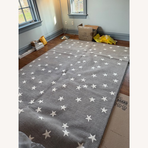 Used Pottery Barn Kids Starry Skies Rug & Pad 7x10 for sale on AptDeco
