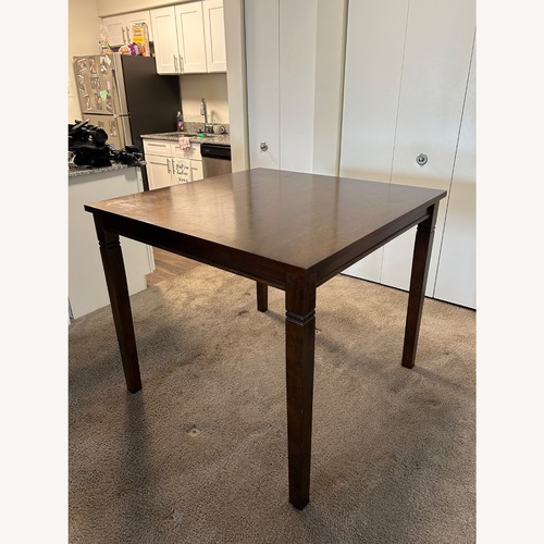 Used Dark Brown Dining Set for sale on AptDeco