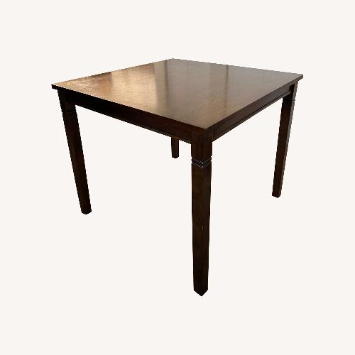 Used Dark Brown Dining Set for sale on AptDeco