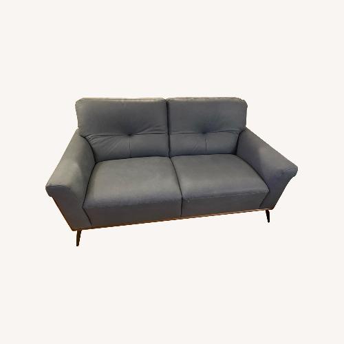Used Dark Gray Leather Loveseat for sale on AptDeco