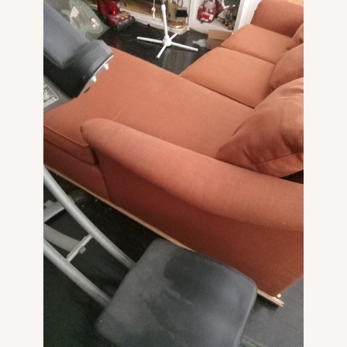 Used Orange 2 Seater Sofa for sale on AptDeco