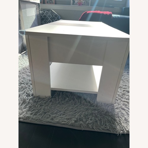 Used Lift Top Extendable Table With Storage for sale on AptDeco