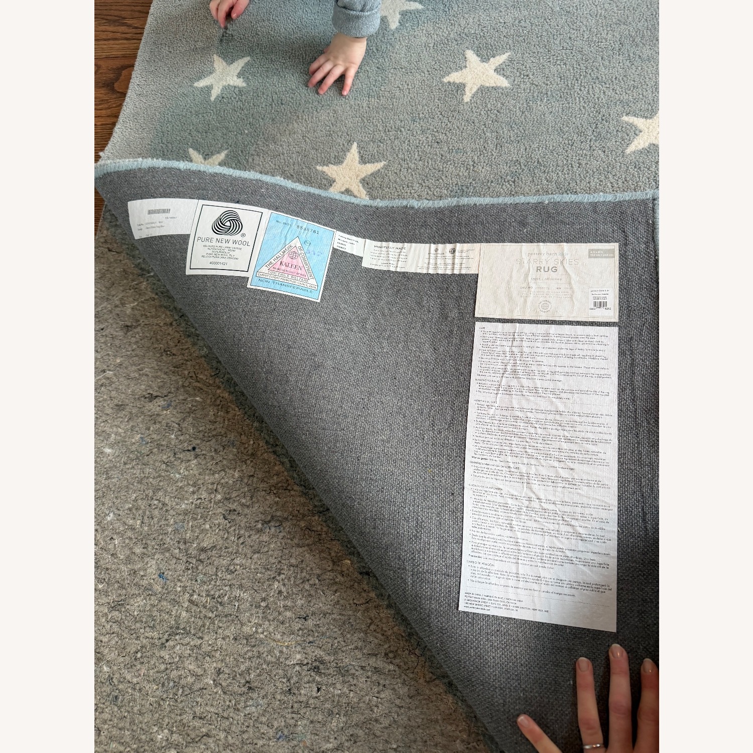 Pottery Barn Blue Starry Wool Rug and Pad 5' x 8' - image-5