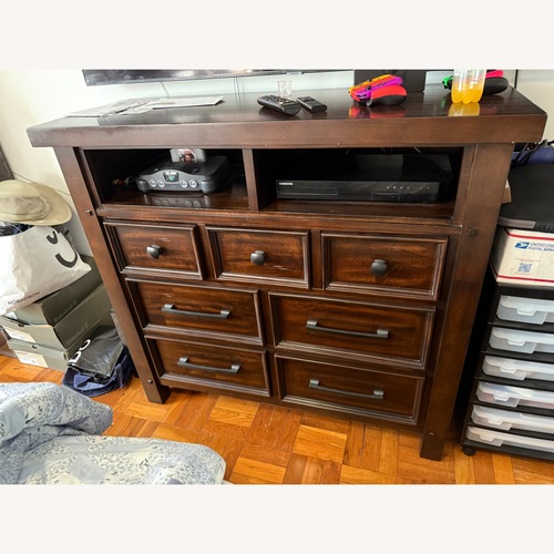 Used Dark Brown Wood Dresser for sale on AptDeco