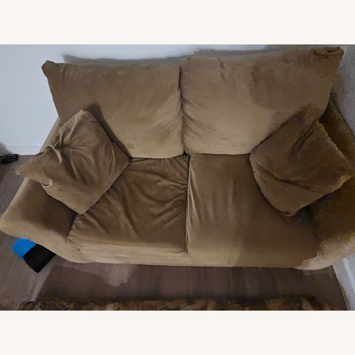 Used Tan Ashley Furniture Loveseat for sale on AptDeco