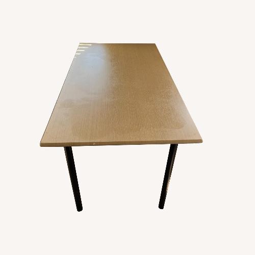 Used Light Brown Dining Table for sale on AptDeco