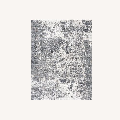 Used Distressed White/Grey Area Rug 8' x 10' for sale on AptDeco