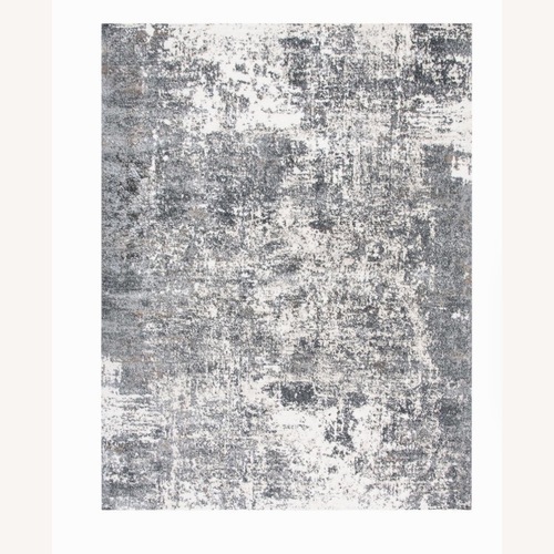 Used Distressed White/Grey Area Rug 8' x 10' for sale on AptDeco