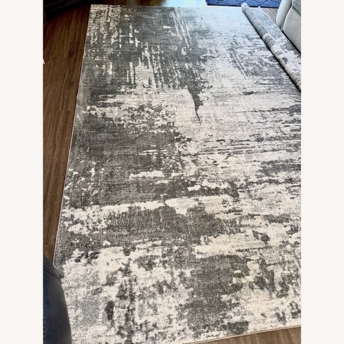 Used Distressed White/Grey Area Rug 8' x 10' for sale on AptDeco