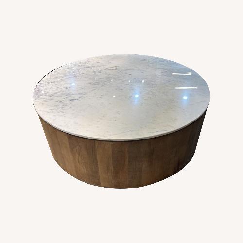 Used Classic Home Josie Marble/Umber Coffee Table for sale on AptDeco