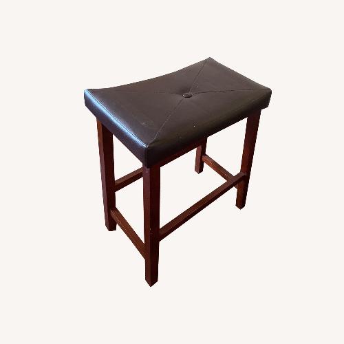 Used Dark Brown Leather Stools for sale on AptDeco