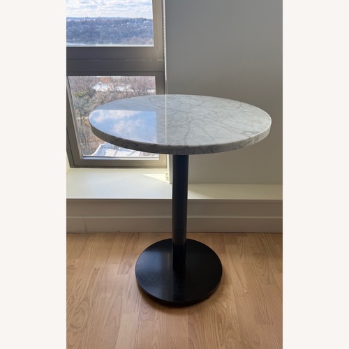 Used West Elm Orbit Restaurant Dining Table - Marble - Round for sale on AptDeco