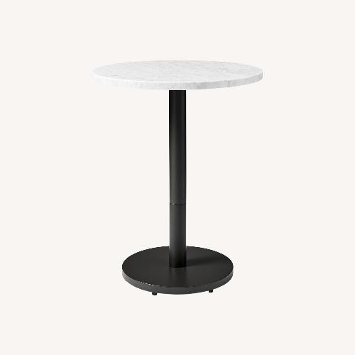 Used West Elm Orbit Restaurant Dining Table - Marble - Round for sale on AptDeco