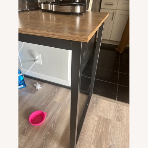 Used Wayfair Light Brown Wood Dining Table for sale on AptDeco