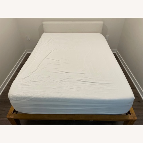 Used Thuma Classic Bed Queen in Walnut and Cream Linen for sale on AptDeco