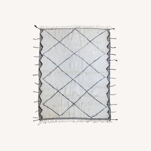 Used Handwoven Moroccan Wool Area Rug 6.5' x 10' for sale on AptDeco