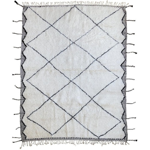 Used Handwoven Moroccan Wool Area Rug 6.5' x 10' for sale on AptDeco